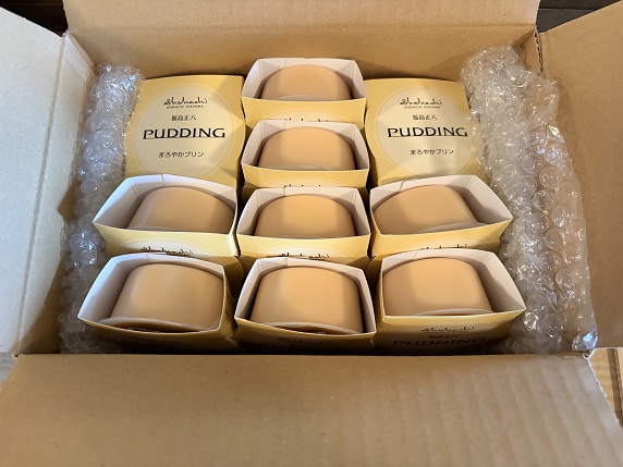 【写真】段ボールで届いた福島正八「まろやかプリン」10個入 【写真】段ボールで届いた福島正八「まろやかプリン」10個入